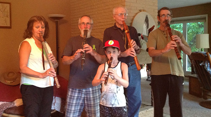 group photo playing flutes