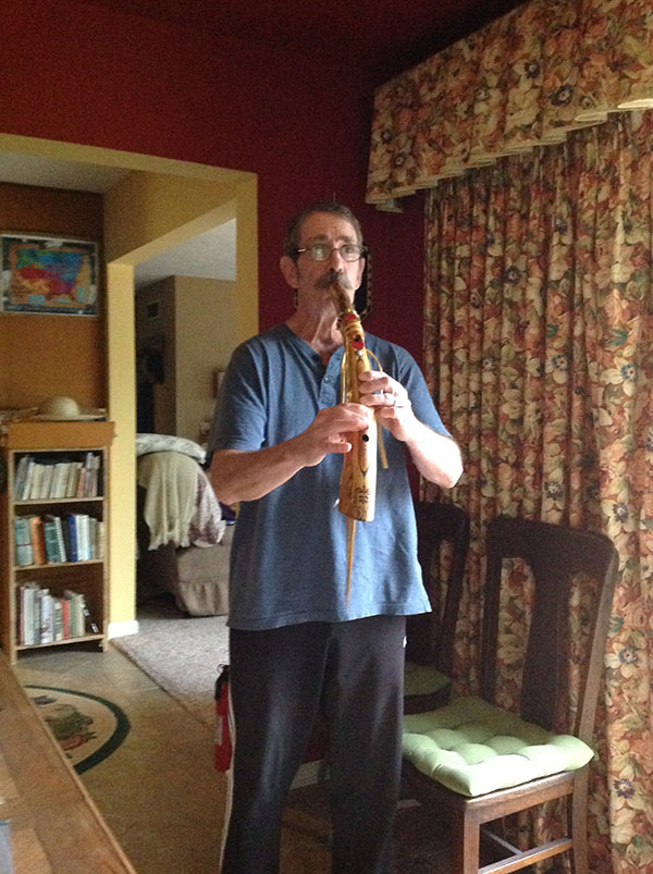 Glen playing the flute