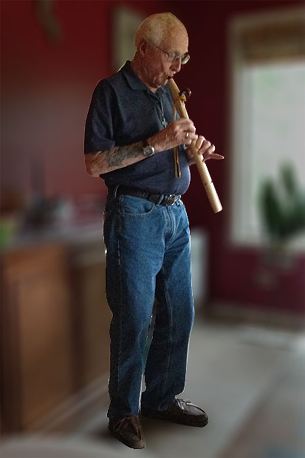 Jack playing the flute